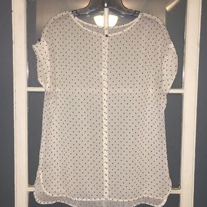 White and black polka dot high-low blouse